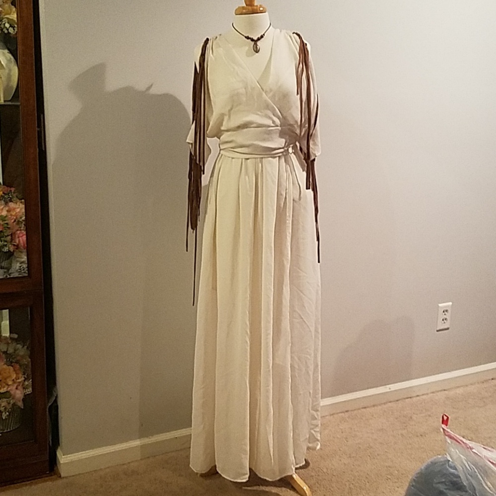 Long white dress with leather fringe at the sleeve